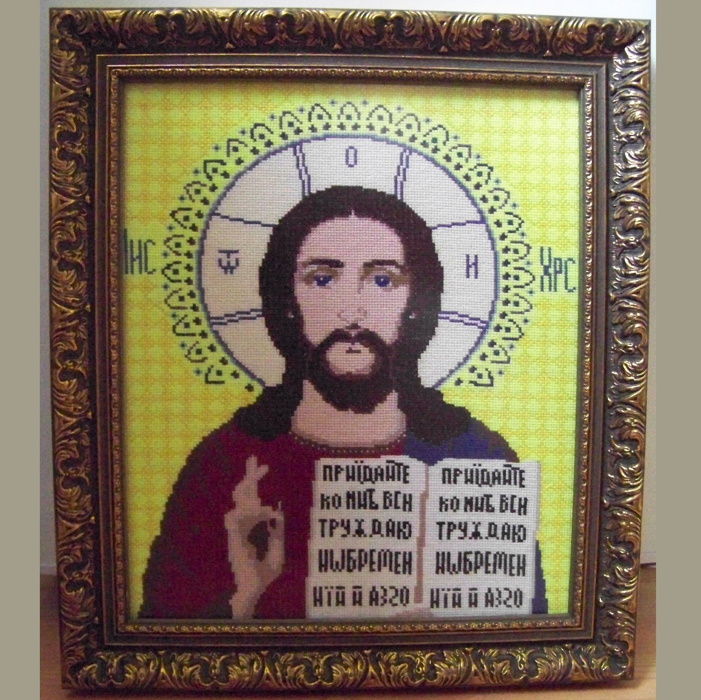 Cross-stitched picture Icon